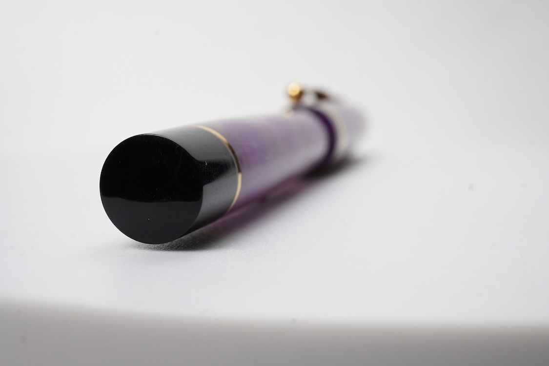 A modern Conway Stewart 'Duro' in stunning purple fitted with 18ct. gold medium nib